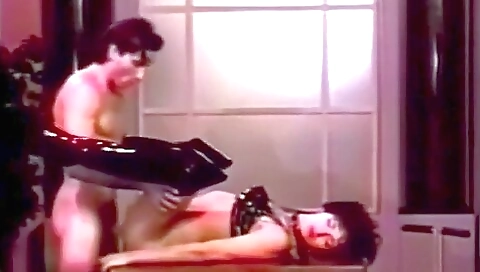 Old man is anal fucked on a chair in a vintage porn film