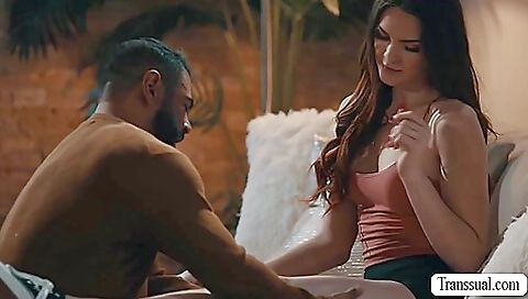 A big black cock fucks a pretty brunette in her pussy