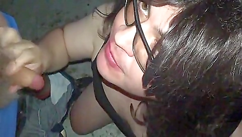 Busty brunette is a good one to suck two dicks deep throats