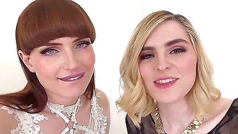 Blonde and brunette in a threesome with a black dildo